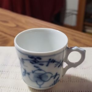 Vintage demitasse blue and white cup
